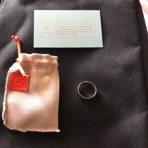 Silver engagement band. Engraved inside: I Love You Love You